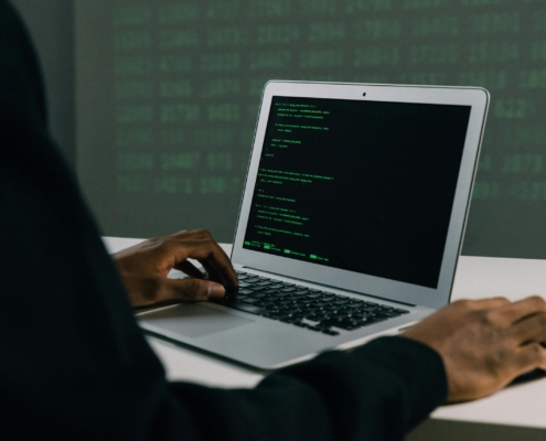 Free Person Using Macbook Air Stock Photo